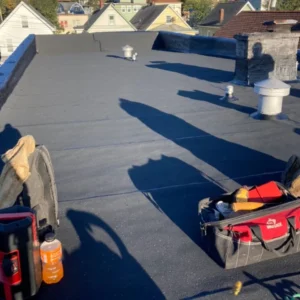 Flat Roof Finished Result with Tools on Roof