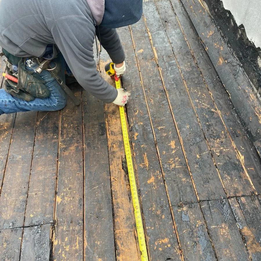 Roof deck measuring during flat roof replacement