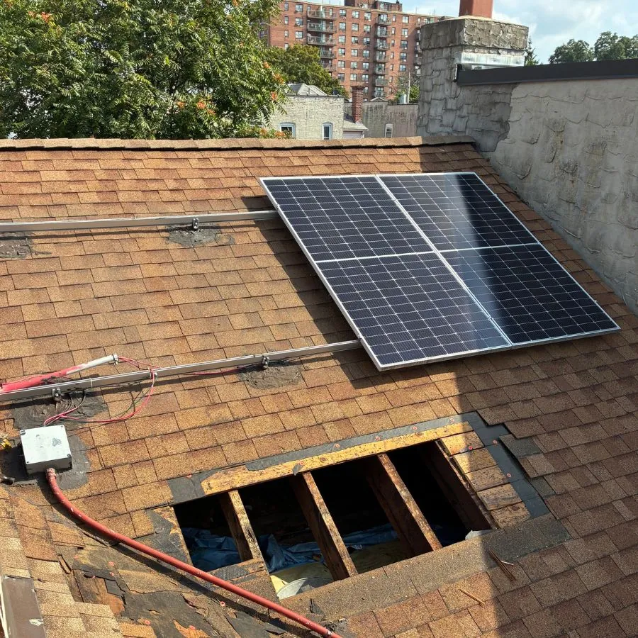 Asphalt shingle roof repair below solar panels