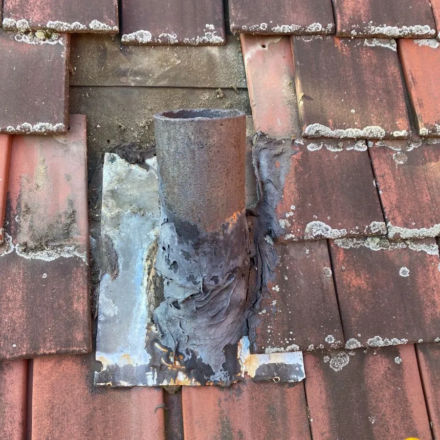 Clay tile roof pipe flashing damage