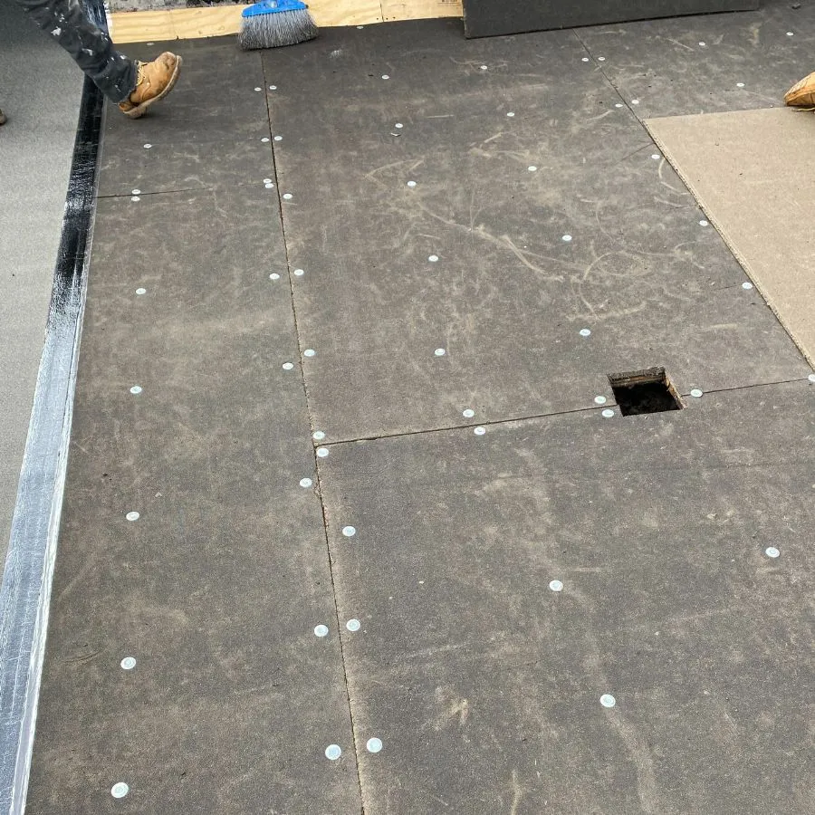 Closeup of roof deck fastening with cutout section