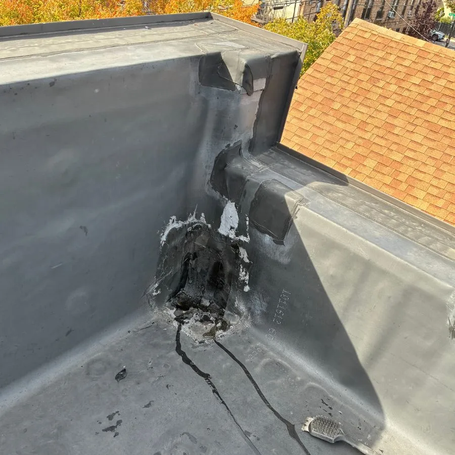 EPDM roof corner leak and patch failure