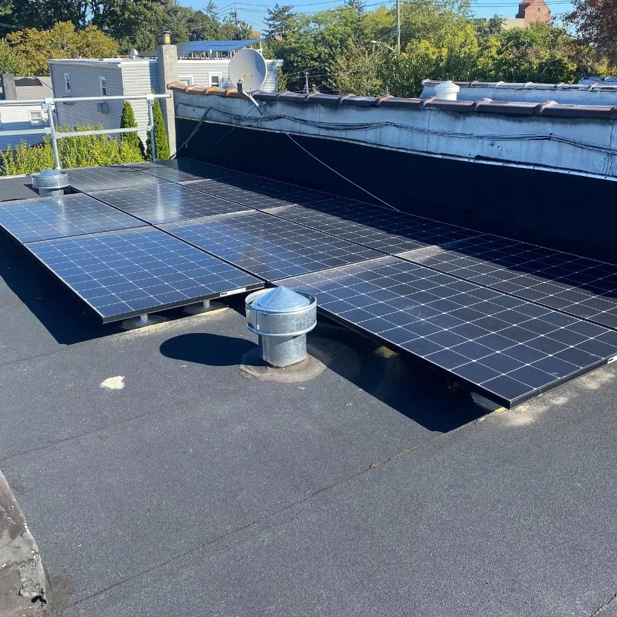 Flat roof solar panels and ventilation cap
