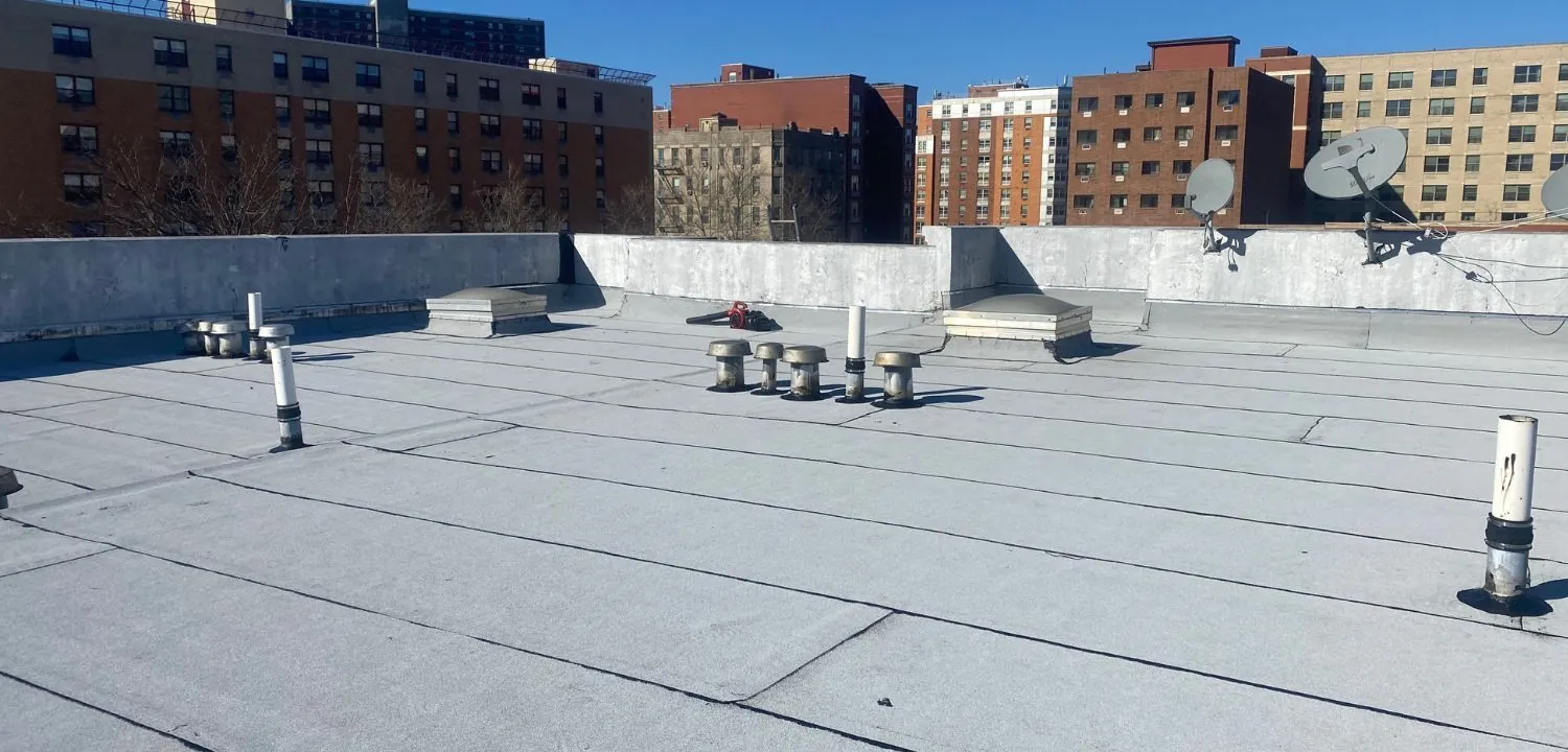 Flat roof with skylights vents and satellite dishes
