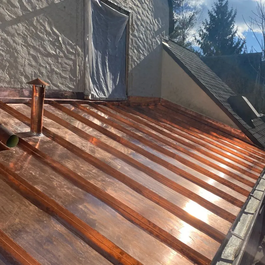 Newly installed copper standing seam roof